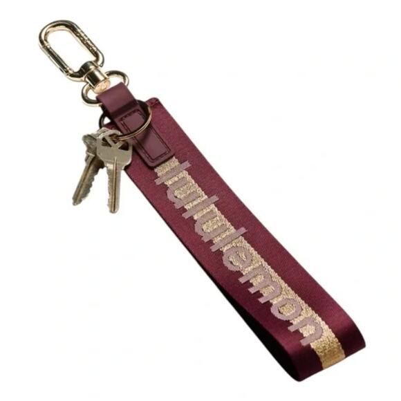 NWT Lululemon Never Lost Keychain Deep Luxe/Bone/Gold - Picture 1 of 4